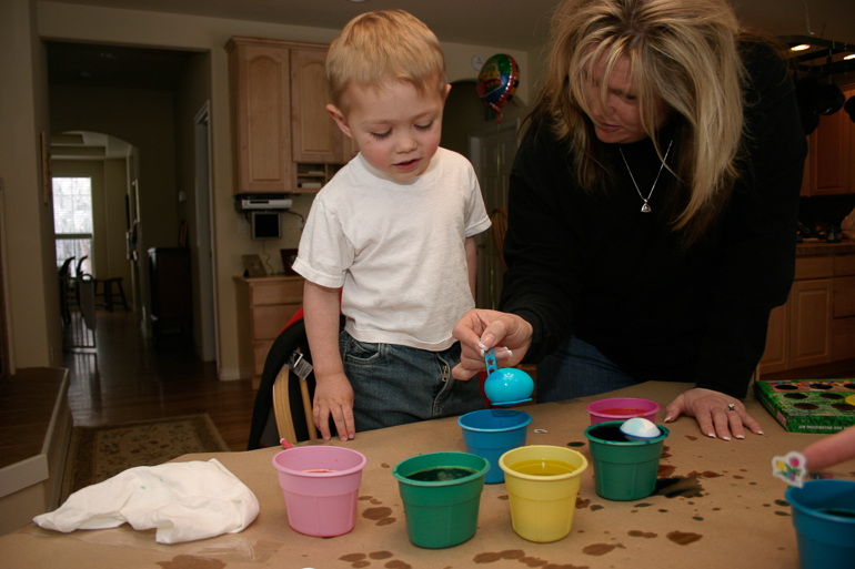 David Kish & Diane Gionfriddo coloring Easter eggs.