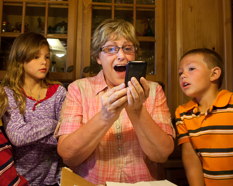 Gabriella & Grant Kish watch as Dian Crites realizes she's going to see Keith Urban in concert.