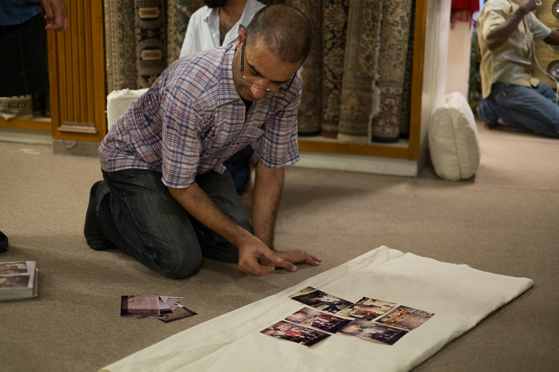 Shop owner, Faruk, displaying the rug making process.