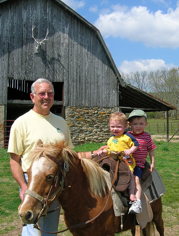 Dan Gibson, David & Grant Kish with Smokey.