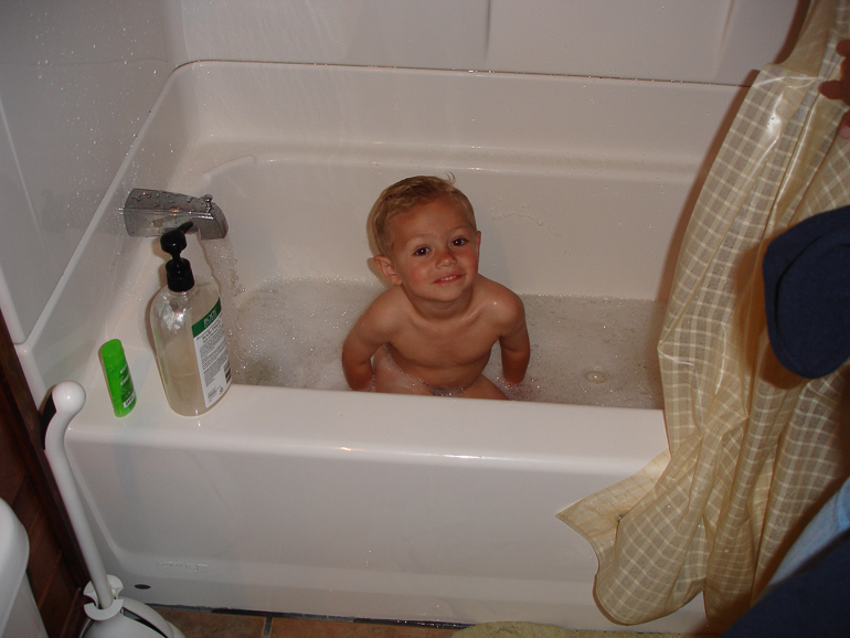 Grant Kish & Gabriella Kish (bashfully hiding behind shower curtain.