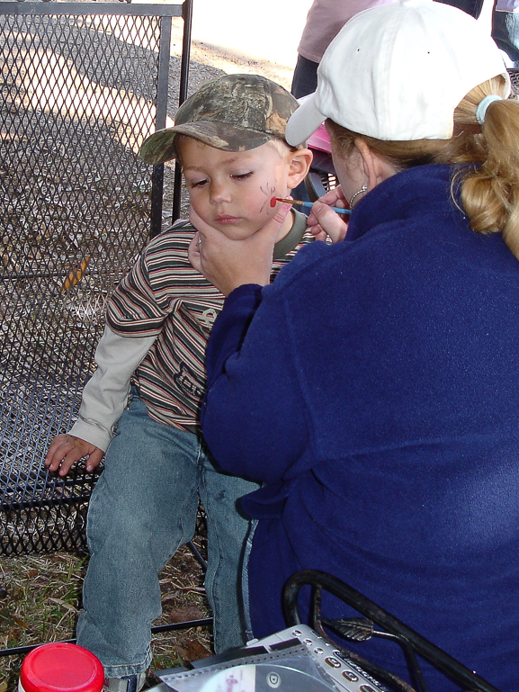 Grant Kish getting a spider face paint at the Pumpkin Patch, Hayden, AL