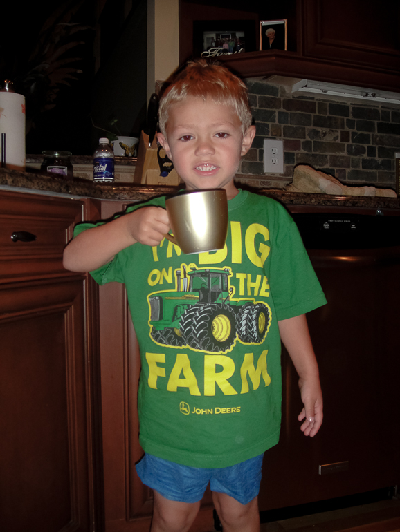 Grant Kish with Golden Dome coffee cup.