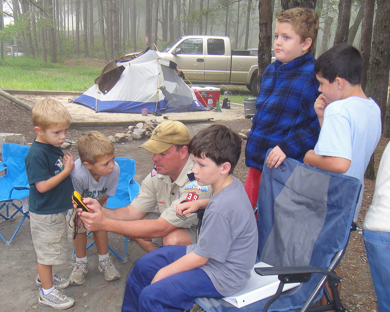 David & Grant Kish and other members of Pack 39 learn about using a GPS from Pack Leader Bo Hunt.