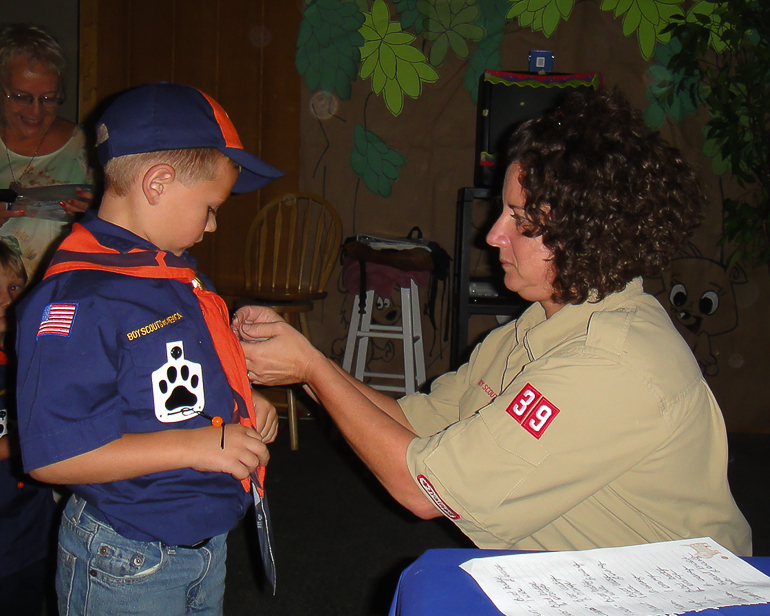 Grant Kish receives his Bobcat Badge for