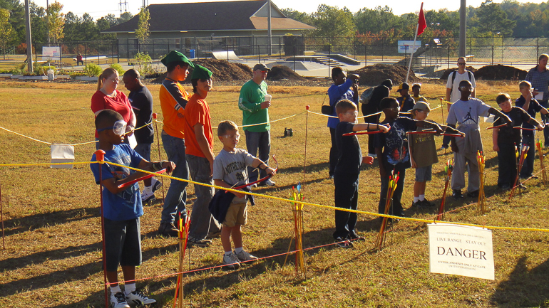 Grant Kish learns about Archery.