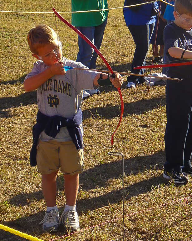 Grant Kish learns about Archery.