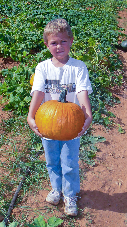 Grant Kish picked out a good one, pumpkin patch, Old Baker Farm, Harpersville, AL.